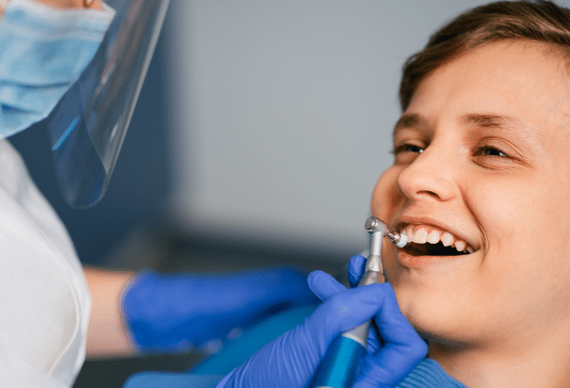 A child receiving dental treatment
