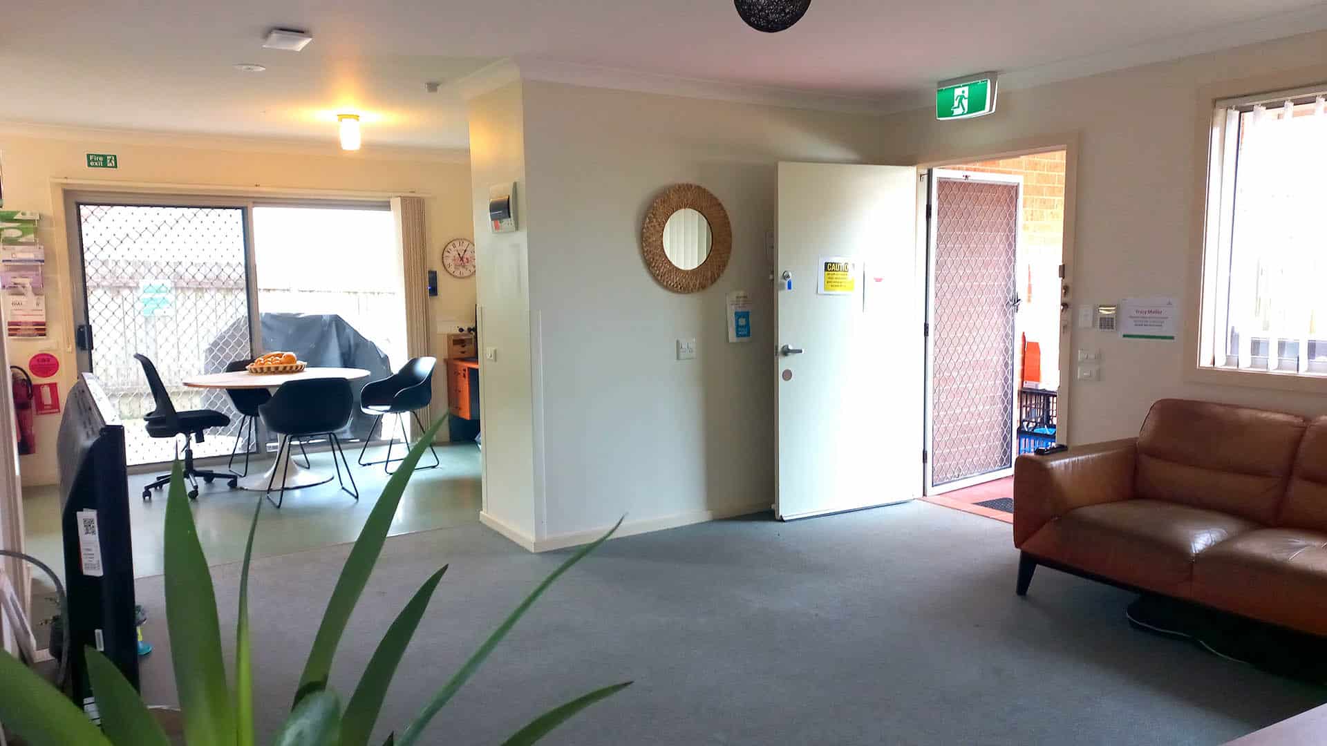 View of the entrance, living and dining areas.
