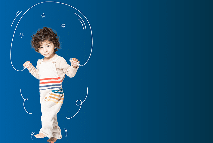 young boy with a skipping rope on a blue background