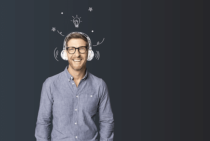 While male wearing a grey shirt and glasses, smiling to camera, on a black background, wearing headphones, surrounded by a halo of illustrations.