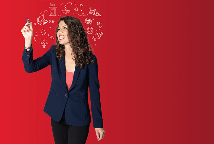 woman with long curly hair, wearing a black suit smiling, on a red background, surrounded by a halo of illustrations