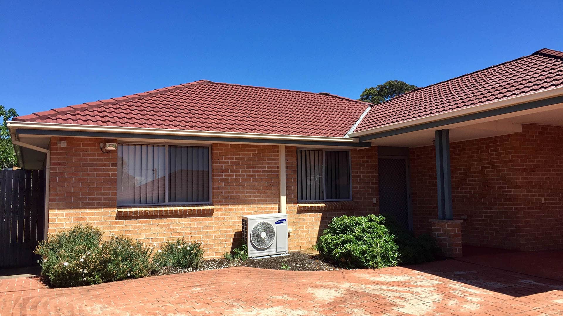 Front view of single story brick home Narraweena 3