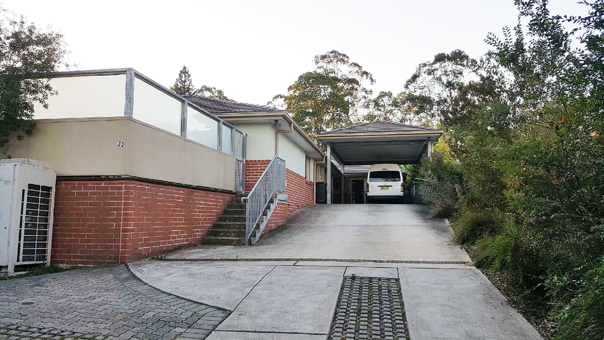 Front view of the house and long driveway at west Ryde 1