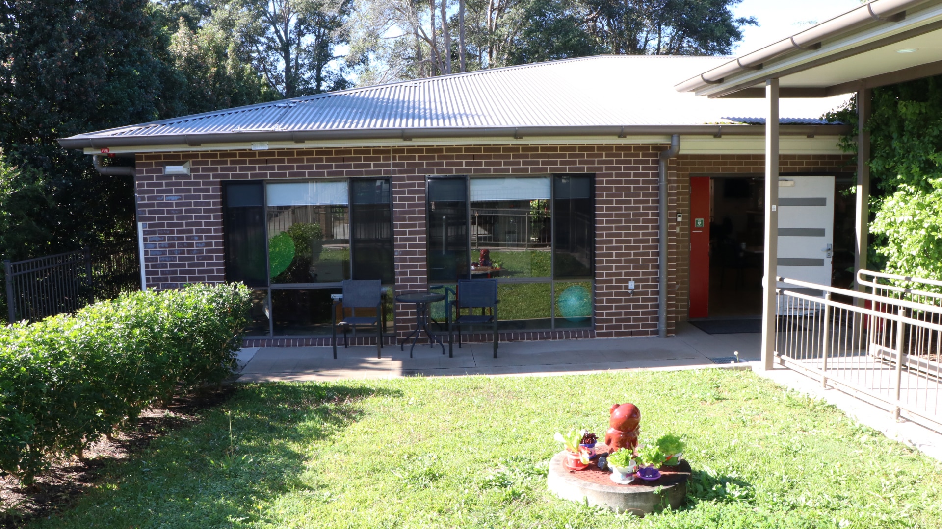 Front view of the Asquith 2 property, a single storey brick home with grassed front yard.