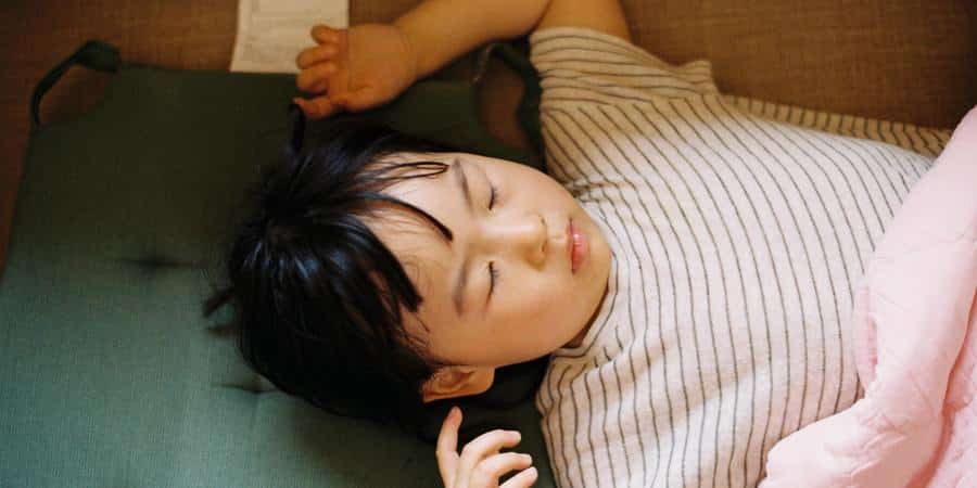 A young Asian child sleeping
