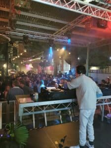 DJ Cooper Smith on the decks in a night club