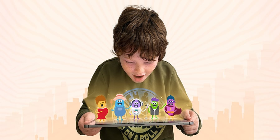 young boy looking down in wonder at 5 small animated characters stadning on top of a ipad he is holding in his hands