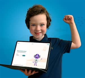 young boy smiling,  holding an open laptop with a screen that reads 'welcome to my voice library'