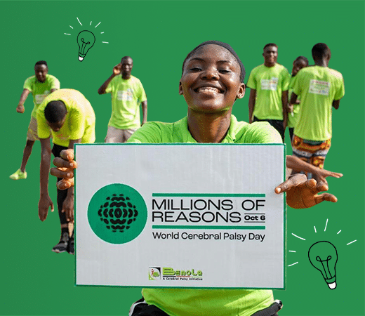 A happy female holding a world cerebral palsy day sign. Six people wearing green shirts in the background.