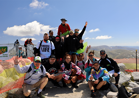 A group of Krazy Kosci Klimb participants posing together for a photo