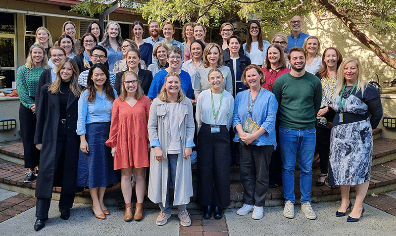 The CPA research team standing in a group together smiling