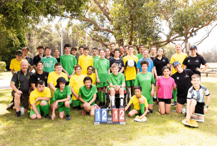 Group of kids dressed in sportswear at a football multi sports camp