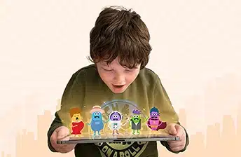 A young boy looking down suprised at an ipad with small animated characters standing on it
