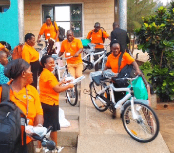 A group of community health workers receiving World Bicycle Relief bicycles in Uganda