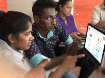 A group of people using eye gaze technology