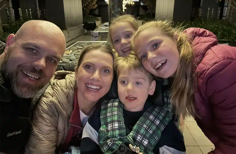 Bennett with his family - mum and dad and two big sisters.