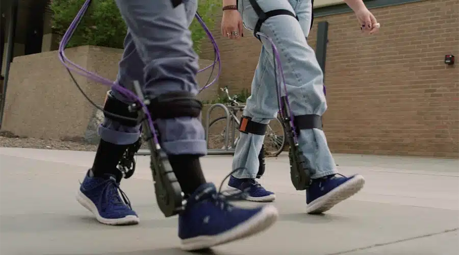 A view of legs wearing exoskeletons.