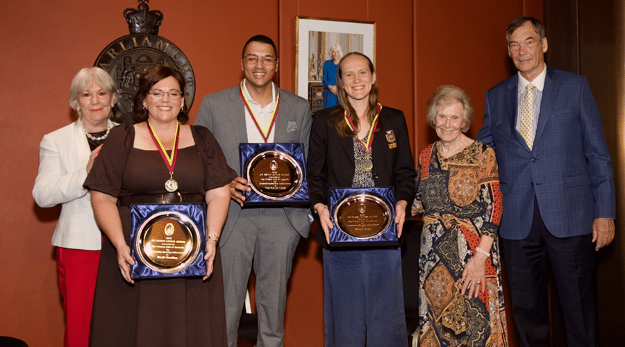 Tamsin with a group of people after receiving her award