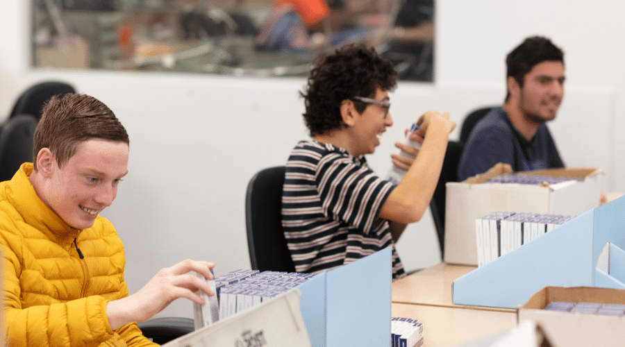 People with disability working in a supported employment environment at Packforce.