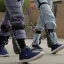 A view of legs wearing exoskeletons.