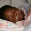 A premature baby sleeping in hospital